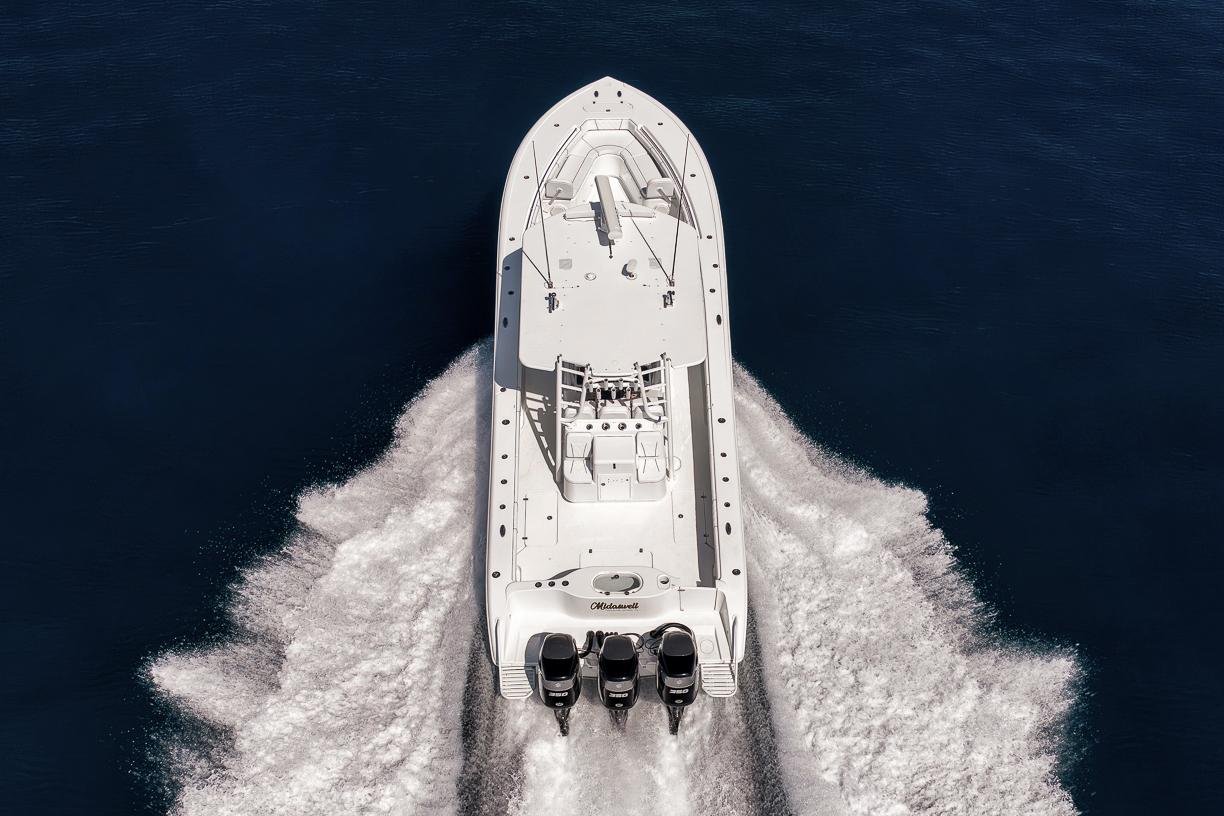 High-performance boat carving a wake at speed