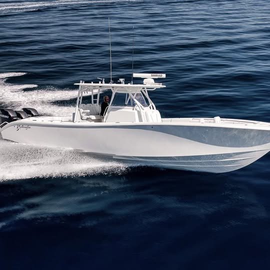 Sportfishing centre console under way offshore